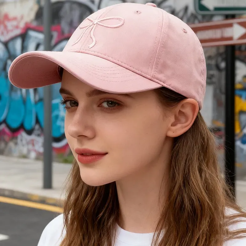 og54te4xcnv.webp Wholesale Women Fashion Cute Solid Color Bowknot Embroidered Baseball Cap - Image 1